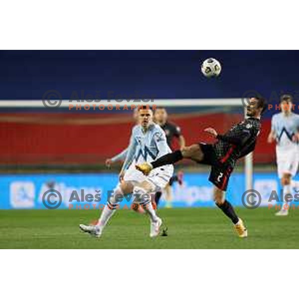 Josip Ilicic and Sime Vrsaljko in action during FIFA World Cup Qualifying round match between Slovenia and Croatia in Ljubljana, Slovenia on March 24, 2021