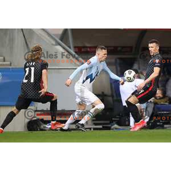 Josip Ilicic and Ivan Perisic in action during FIFA World Cup Qualifying round match between Slovenia and Croatia in Ljubljana, Slovenia on March 24, 2021