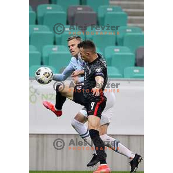 Josip Ilicic and Ivan Perisic in action during FIFA World Cup Qualifying round match between Slovenia and Croatia in Ljubljana, Slovenia on March 24, 2021
