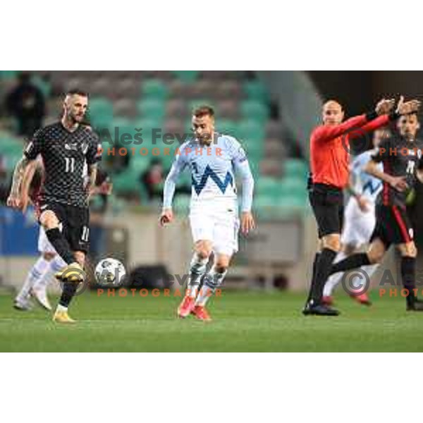 Marcelo Brozovic and Sandi Lovric in action during FIFA World Cup Qualifying round match between Slovenia and Croatia in Ljubljana, Slovenia on March 24, 2021