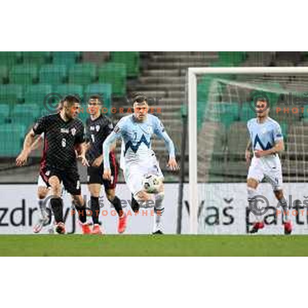 Mateo Kovacic and Josip Ilicic in action during FIFA World Cup Qualifying round match between Slovenia and Croatia in Ljubljana, Slovenia on March 24, 2021
