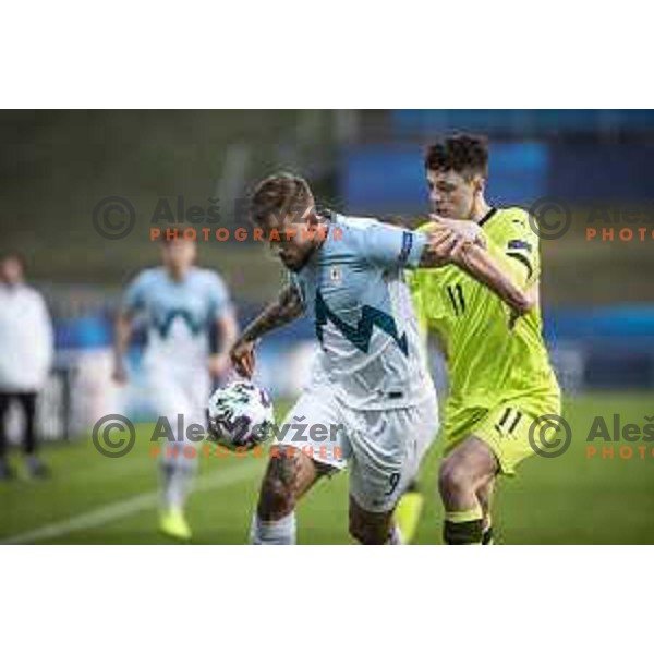 Zan Medved vs Ladislav Krejci in action during U21 UEFA European Championship 2021 football match between Slovenia and Czech Republic in Arena Z’dezele, Celje, Slovenia on March 27, 2021