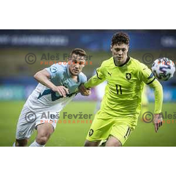 Timi Max Elsnik vs Ladislav Krejci in action during U21 UEFA European Championship 2021 football match between Slovenia and Czech Republic in Arena Z’dezele, Celje, Slovenia on March 27, 2021