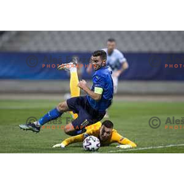 Patrick Cutrone and Igor Vekic in action at European Under- 21 Championship 2021 football match between Slovenia and Italy in Maribor, Slovenia on March 30, 2021