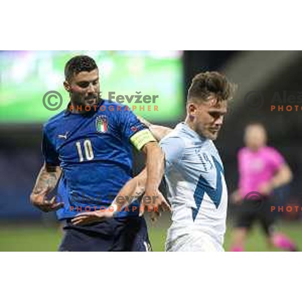 Patrick Cutrone and Nik Prelec in action at European Under- 21 Championship 2021 football match between Slovenia and Italy in Maribor, Slovenia on March 30, 2021