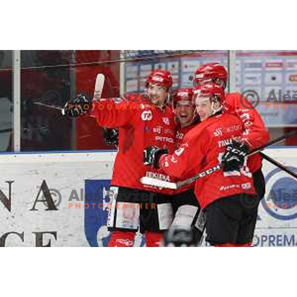 Nejc Stojan, Jaka Sodja, Blaz Tomazevic celebrate goal during first match of semi-final of Alps league between SIJ Acroni Jesenice and Asiago in Jesenice, Slovenia on April 8, 2021