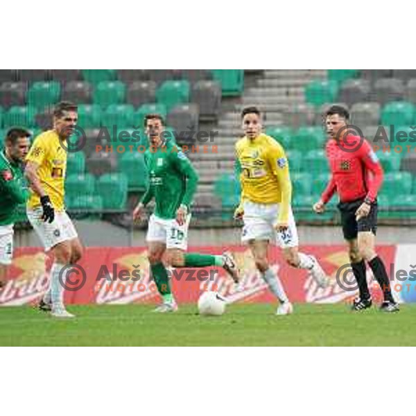 Andres Vombergar and Milan Tucic in action during Prva liga Telekom Slovenije 2020-2021 football match between Olimpija and Bravo in SRC Stozice, Ljubljana on April 13, 2021