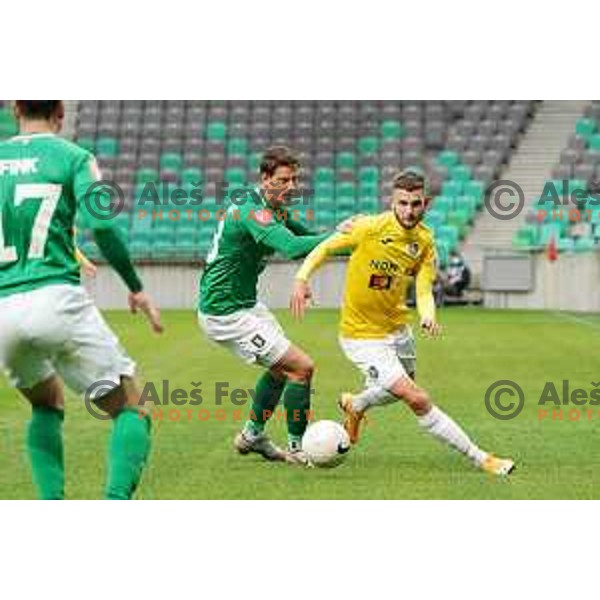 Andres Vombergar and Almin Kurtovic in action during Prva liga Telekom Slovenije 2020-2021 football match between Olimpija and Bravo in SRC Stozice, Ljubljana on April 13, 2021