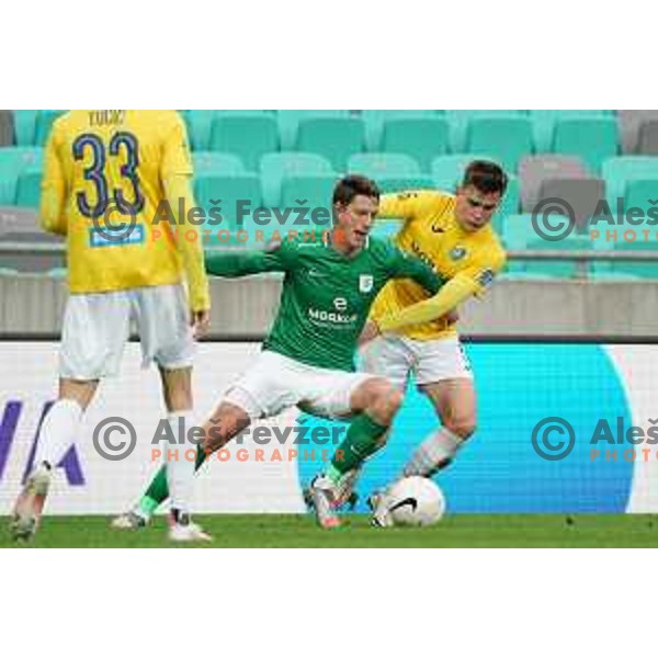 Andres Vombergar and Mark Spanring in action during Prva liga Telekom Slovenije 2020-2021 football match between Olimpija and Bravo in SRC Stozice, Ljubljana on April 13, 2021