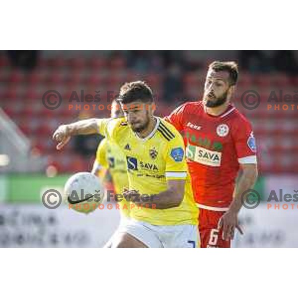 Rok Kronaveter and Nemanja Jaksic in action during Prva liga Telekom Slovenije football match between Aluminij and Maribor in Kidricevo, Slovenija on April 16, 2021