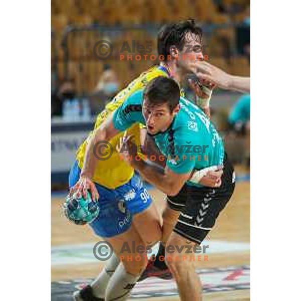 in action during 1.NLB league handball match between Celje Pivovarna Lasko and Gorenje Velenje in Arena Zlatorog, Celje, Slovenia on April 14, 2021