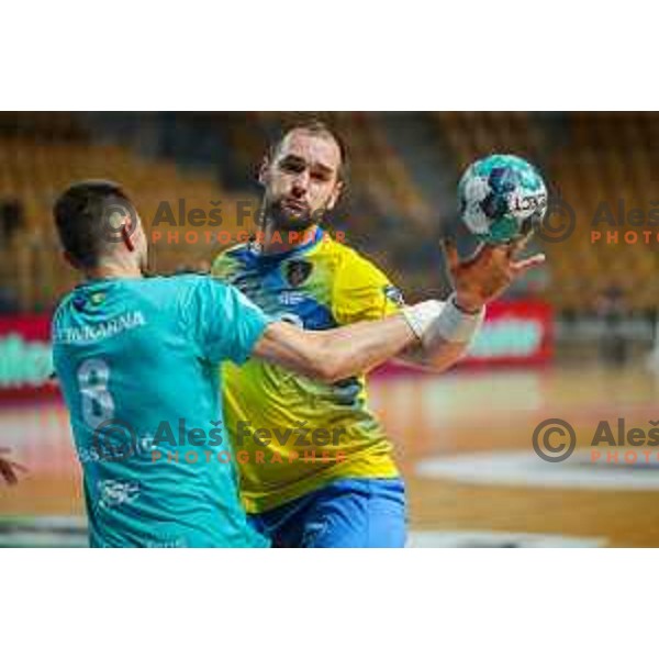 in action during 1.NLB league handball match between Celje Pivovarna Lasko and Gorenje Velenje in Arena Zlatorog, Celje, Slovenia on April 14, 2021