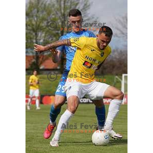 Arnel Jakupovic of Domzale and Vanja Drkusic in action during Prva Liga Telekom Slovenije 2020-2021 football match between Bravo and Domzale in Ljubljana, Slovenia on April 17, 2021