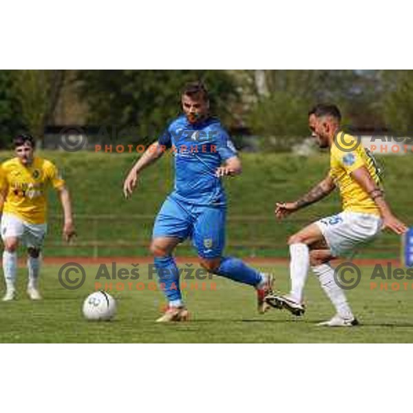 Janez Pisek of Domzale and Vanja Drkusic in action during Prva Liga Telekom Slovenije 2020-2021 football match between Bravo and Domzale in Ljubljana, Slovenia on April 17, 2021