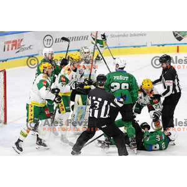 Ziga Pesut and Marc-Olivier Vallerand of SZ Olimpija in action during fifth match of the semi-final of Alps League ice-hockey match between SZ Olimpija and Lustenau in Tivoli Hall, Ljubljana, Slovenia on April 17, 2021