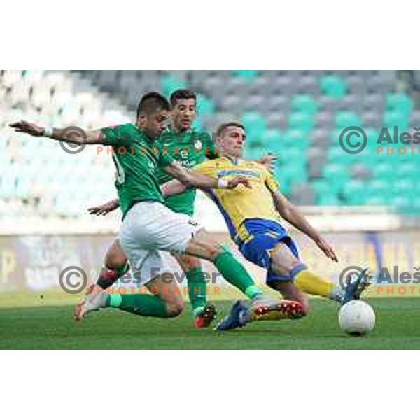 Vujadin Savic and Nardin Mulahusejnovic in action during Prva Liga Telekom Slovenije 2020-2021 football match between Olimpija and Koper in SRC Stozice, Ljubljana, Slovenia on April 21, 2021