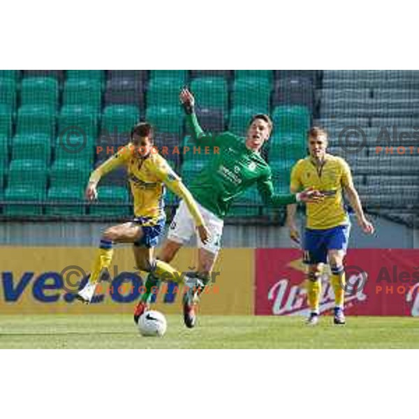 Mihail Caimacov and Andres Vombergar in action during Prva Liga Telekom Slovenije 2020-2021 football match between Olimpija and Koper in SRC Stozice, Ljubljana, Slovenia on April 21, 2021