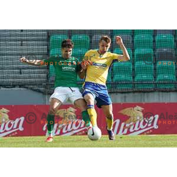 Radivoj Bosic and Zan Zuzek in action during Prva Liga Telekom Slovenije 2020-2021 football match between Olimpija and Koper in SRC Stozice, Ljubljana, Slovenia on April 21, 2021