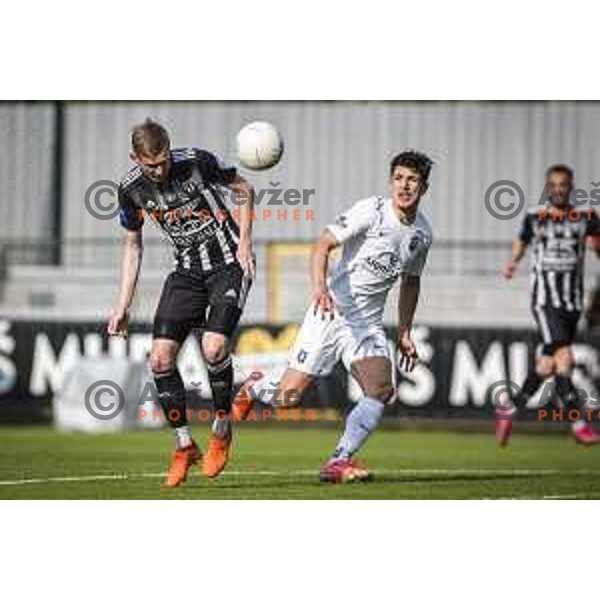 Zan Karnicnik and Radivoj Bosic in action during Prva liga telekom Slovenije football match between Mura and Olimpija Ljubljana in Fazanerija, Murska Sobota, Slovenia on April 25, 2021