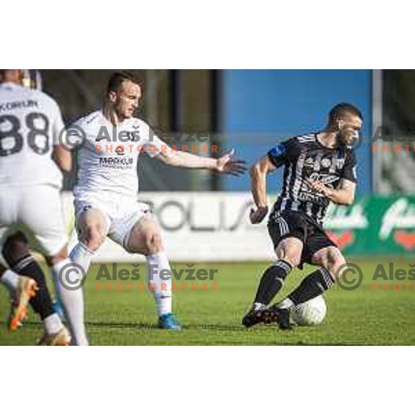Djordje Ivanovic and Nino Kouter in action during Prva liga telekom Slovenije football match between Mura and Olimpija Ljubljana in Fazanerija, Murska Sobota, Slovenia on April 25, 2021
