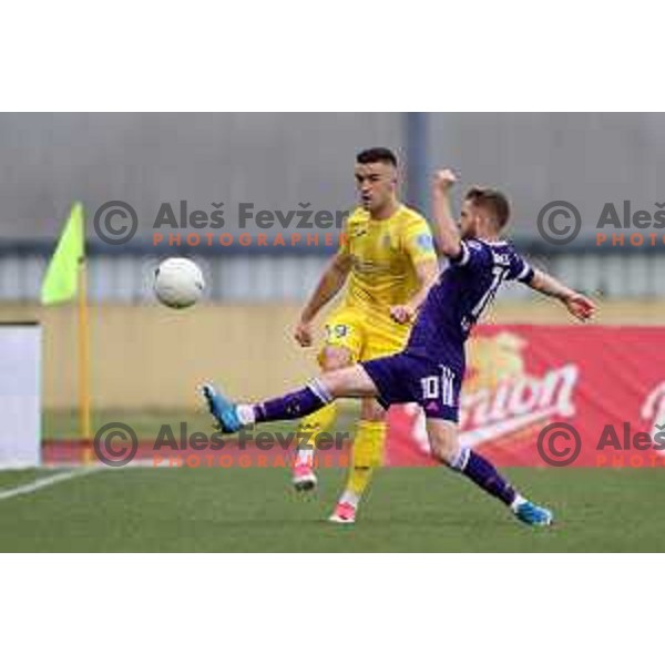 Arnel Jakupovic and Rudi Pozeg Vancas in action during Pivovarna Union Slovenian Cup football match between Domzale and Maribor in Domzale, Slovenia on April 27, 2021