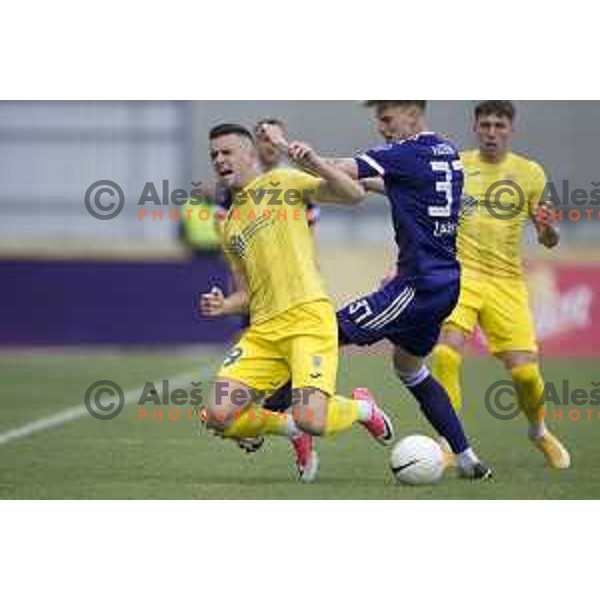 Arnel Jakupovic and Luka Koblar in action during Pivovarna Union Slovenian Cup football match between Domzale and Maribor in Domzale, Slovenia on April 27, 2021