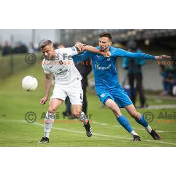 Denis Sme vs Nermin Haljeta in action during Slovenian cup football match between Nafta 1903 and Olimpija Ljubljana in Lendava, Slovenia on April 28, 2021