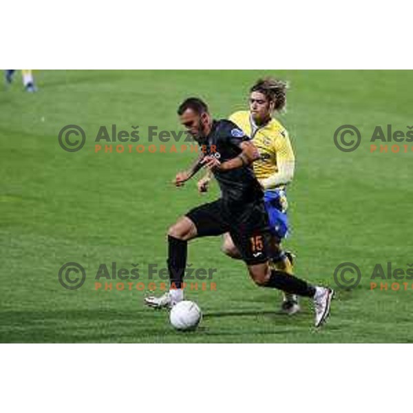 Vanja Drkusic and Claudio Spinelli in action during Prva Liga Telekom Slovenije 2020-2021 football match between Koper and Bravo in Koper, Slovenia on May 1, 2021