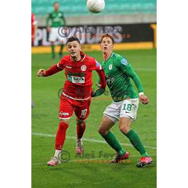 Armin Djerlek and Andres Vombergar in action during Prva Liga Telekom Slovenije 2020-2021 football match between Olimpija and Aluminij in SRC Stozice, Ljubljana, Slovenia on May 2, 2021