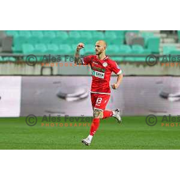 Aljaz Krefl scores penalty kick during Prva Liga Telekom Slovenije 2020-2021 football match between Olimpija and Aluminij in SRC Stozice, Ljubljana, Slovenia on May 2, 2021