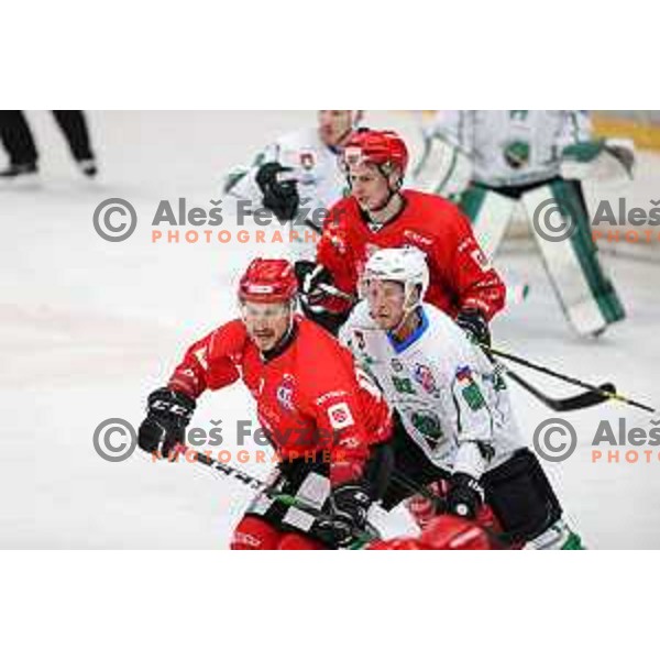 Saso Rajsar and Tadej Cimzar in action during second game of the Final of Slovenian Championship ice-hockey match between SIJ Acroni Jesenice and SZ Olimpija in Jesenice, Slovenia on May 3, 2021