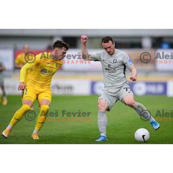 Andraz Zinic and Djordje Ivanovic in action during Prva Liga Telekom Slovenije 2020-2021 football match between Domzale and Olimpija in Domzale, Slovenia on May 5, 2021