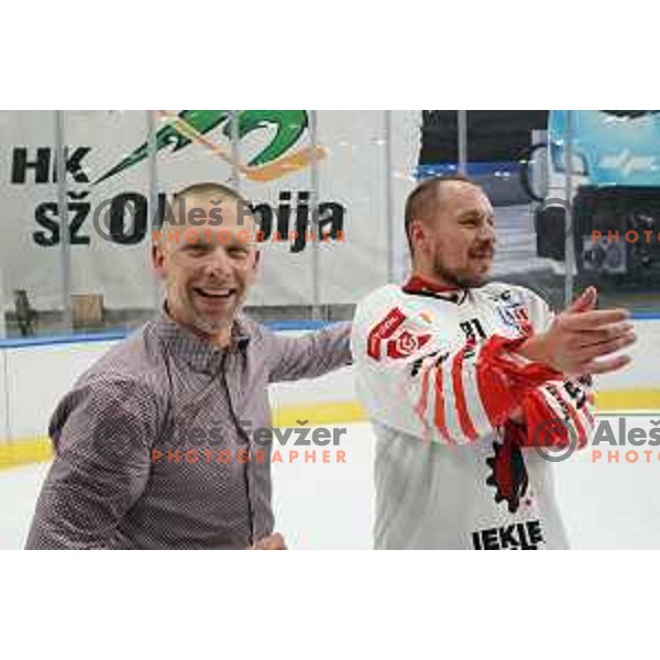 Mitja Sivic, head coach of SIJ Acroni Jesenice and Saso Rajsar celebrate Slovenian Championship ice-hockey title after victory in fifth match v of the Final between SZ Olimpija and SIJ Acroni Jesenice in Ljubljana, Slovenia on May 10, 2021
