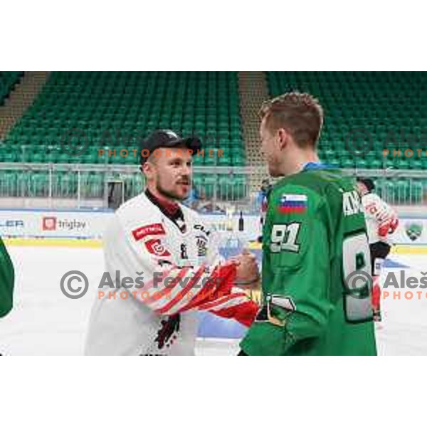 Saso Rajsar of SIJ Acroni Jesenice and Tadej Cimzar at Slovenian Championship ice-hockey Final between SZ Olimpija and SIJ Acroni Jesenice in Ljubljana, Slovenia on May 10, 2021