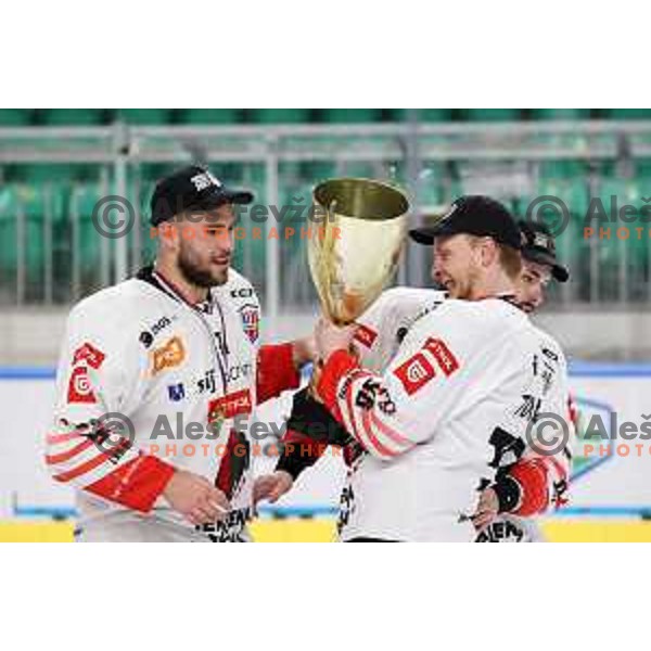 Zan Jezovsek and Blaz Tomazevic of SIJ Acroni Jesenice celebrate Slovenian Championship ice-hockey title after victory in fifth match v of the Final between SZ Olimpija and SIJ Acroni Jesenice in Ljubljana, Slovenia on May 10, 2021