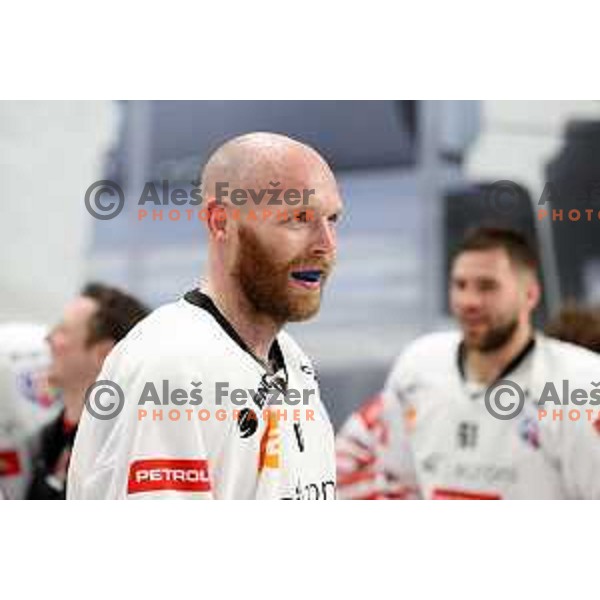 Andrej Tavzelj and players of SIJ Acroni Jesenice celebrate Slovenian Championship ice-hockey title after victory in fifth match v of the Final between SZ Olimpija and SIJ Acroni Jesenice in Ljubljana, Slovenia on May 10, 2021