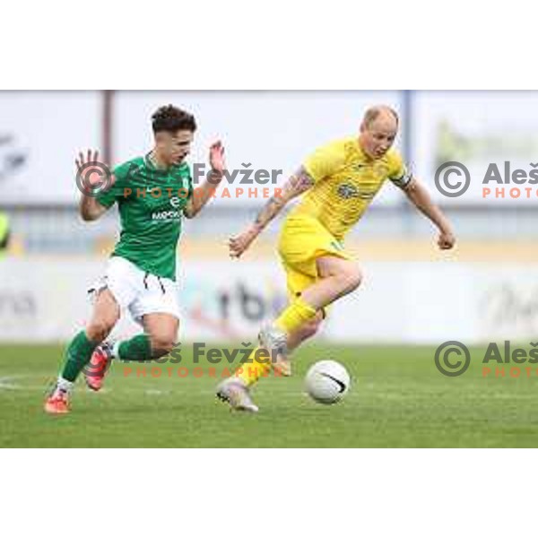 Radivoj Bosic and Senijad Ibricic in action during Pivovarna Union Slovenian Cup 2020-2021 football match between Domzale and Olimpija in Domzale, Slovenia on May 12, 2021