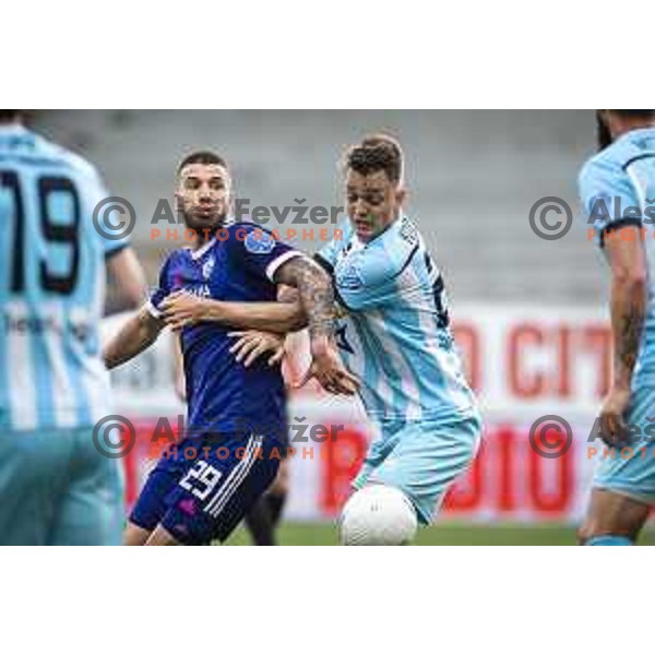 Jan Mlakar vs Tine Kavcic in action during Prva liga Telekom Slovenije football match between Maribor and Gorica in Ljudski vrt, Maribor, Slovenia on May 15, 2021