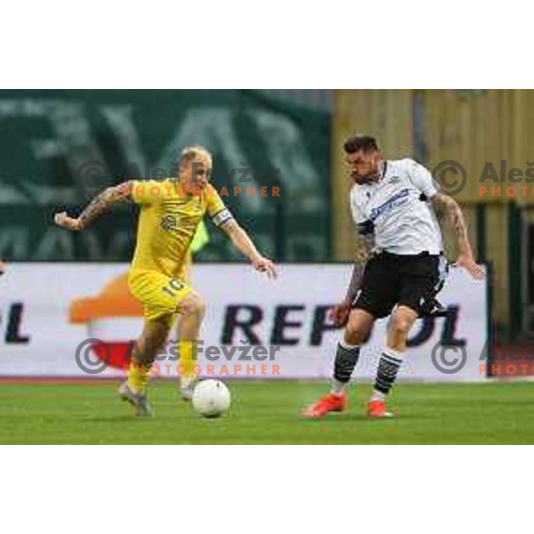 Senijad Ibricic and Ivica Guberac in action during Prva Liga Telekom Slovenije 2020-2021 football match between Domzale and Koper in Domzale, Slovenia on May 16, 2021