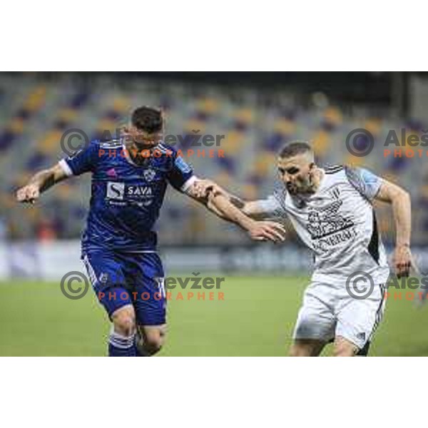 Aljosa Matko vs Nino Kouter in action during Prva liga Telekom Slovenije football match between Maribor and Mura in Ljudski vrt, Maribor, Slovenia on May 22, 2021