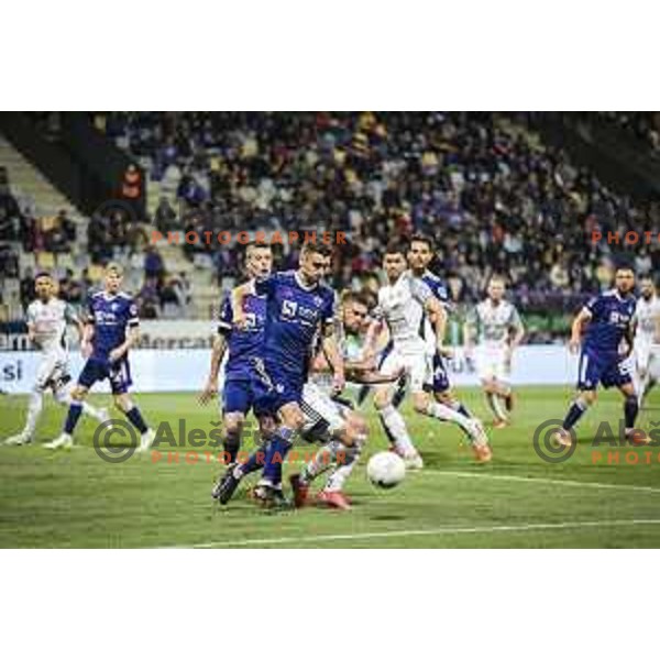 Blaz Vrhovec vs Amadej Marosa in action during Prva liga Telekom Slovenije football match between Maribor and Mura in Ljudski vrt, Maribor, Slovenia on May 22, 2021