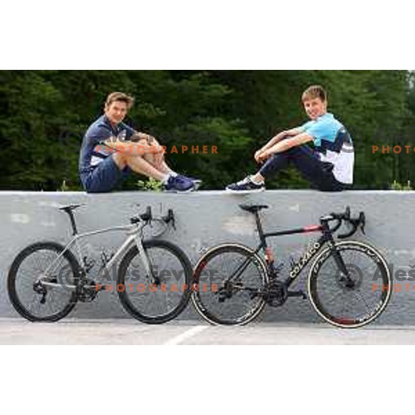 Andraz Vehovar, Olympic silver medalist of Atlanta 1996 Summer games and Tadej Pogacar, member of Slovenia Olympic team for Tokyo Summer Olympic gamers during practice session in Planica, Slovenia on June 15, 2021