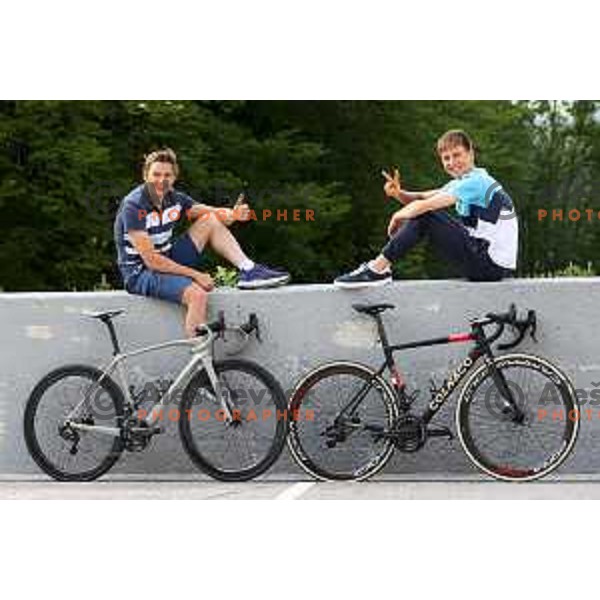 Andraz Vehovar, Olympic silver medalist of Atlanta 1996 Summer games and Tadej Pogacar, member of Slovenia Olympic team for Tokyo Summer Olympic gamers during practice session in Planica, Slovenia on June 15, 2021
