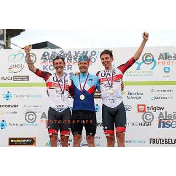 Jan Polanc (second), winner Jan Tratnik and Tadej Pogacar (third) at podium at Slovenian National Time-Trial Championship in Koper, Slovenia on June 17, 2021