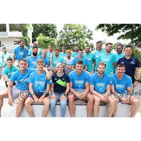 Slovenia Men\'s basketball Olympic team in company of Slovenska Bakla (Slovenian Torch) in front of Bled Rose hotel, Slovenia on July 13, 2021