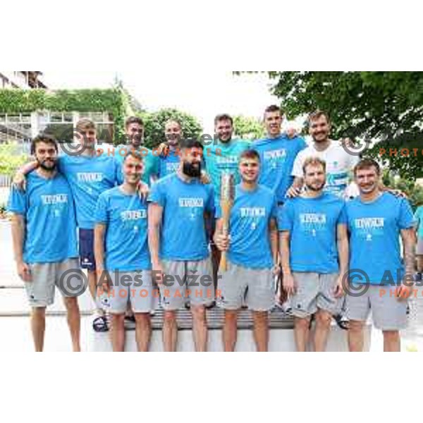 Slovenia Men\'s basketball Olympic team in company of Slovenska Bakla (Slovenian Torch) in front of Bled Rose hotel, Slovenia on July 13, 2021