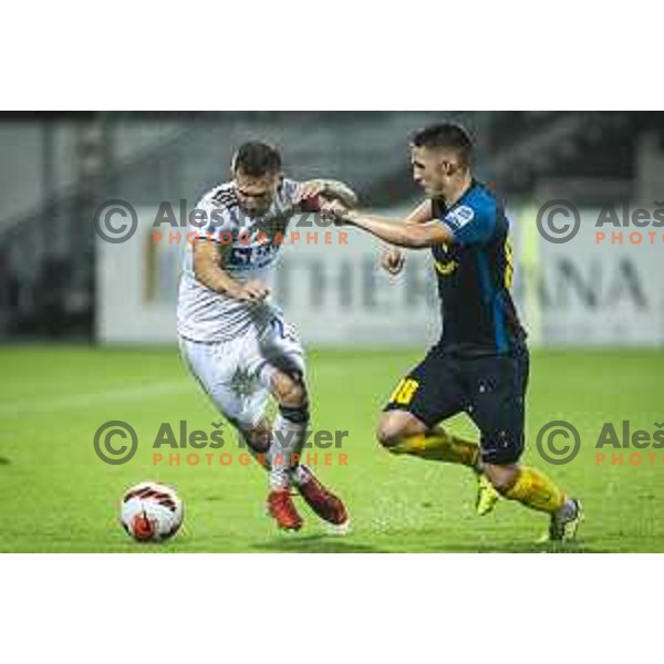 Martin Milec vs Tamar Svetlin in action during Prva liga Telemach football match between Celje and Maribor in Arena z’Dežele, Celje, Slovenia on July 18, 2021