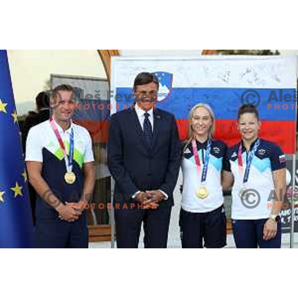 Janja Garnbret, Tina Trstenjak and Benjamin Savsek during reception of Slovenia Olympic team of Tokyo 2020 Summer Olympic games held by president of Slovenia at Brdo Castle, Slovenia on August 10, 2021