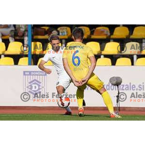 In action during Prva Liga Telemach football match between Domzale and Olimpija in Domzale, Slovenia on August 25, 2021