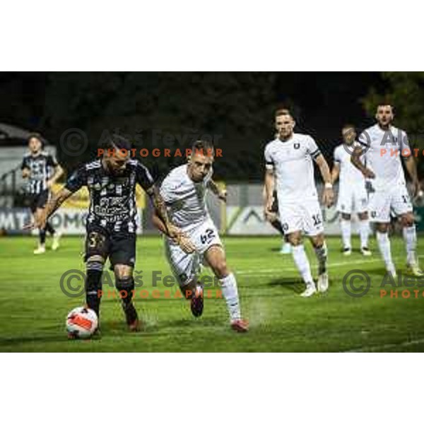 Mitja Lotric vs Michael Pavlovic in action during Prva liga Telemach football match between Mura and Olimpija in Fazanerija, Murska Sobota, Slovenia on September 11, 2021